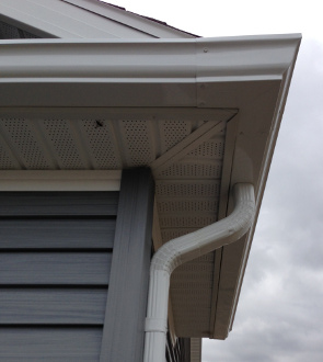 Gutter and Downspout on Corner of House
